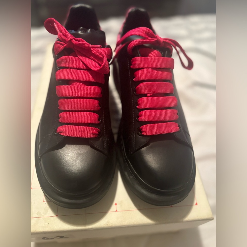 Alexander McQueen Black Sneakers with Vibrant Red Laces